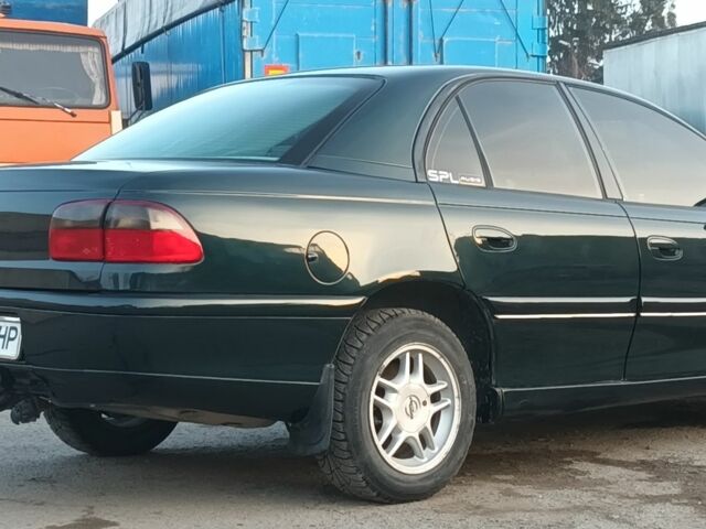 Зеленый Опель Омега, объемом двигателя 2 л и пробегом 380 тыс. км за 2600 $, фото 6 на Automoto.ua