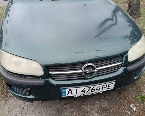 Зеленый Опель Омега, объемом двигателя 1.98 л и пробегом 300 тыс. км за 2000 $, фото 5 на Automoto.ua