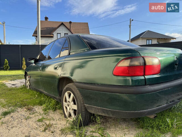 Зеленый Опель Омега, объемом двигателя 2 л и пробегом 300 тыс. км за 1700 $, фото 3 на Automoto.ua