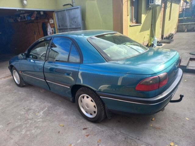 Зеленый Опель Омега, объемом двигателя 2 л и пробегом 402 тыс. км за 4000 $, фото 3 на Automoto.ua