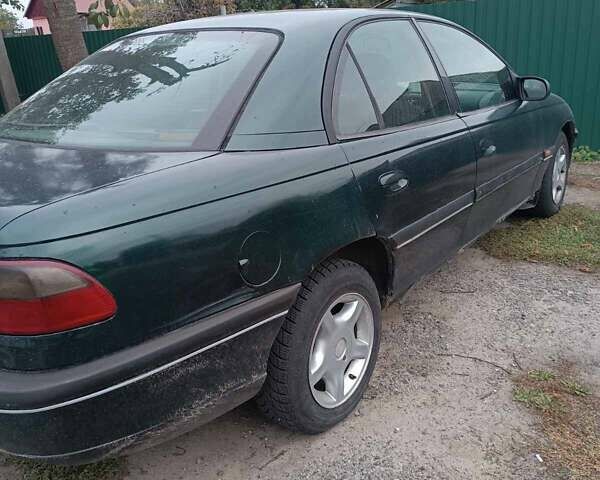 Зеленый Опель Омега, объемом двигателя 1.98 л и пробегом 300 тыс. км за 2000 $, фото 2 на Automoto.ua