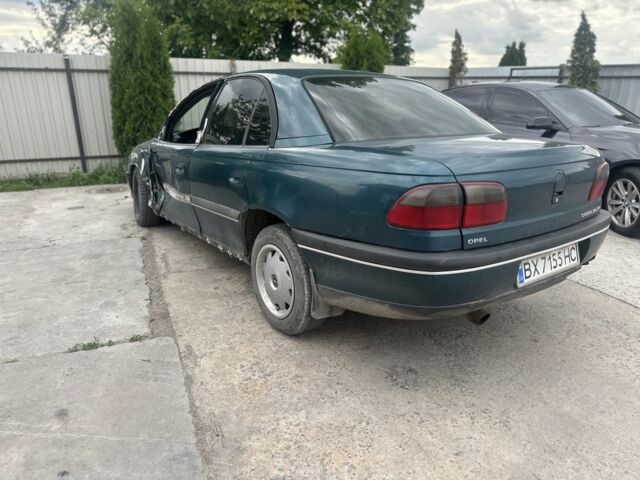 Зеленый Опель Омега, объемом двигателя 2 л и пробегом 240 тыс. км за 700 $, фото 6 на Automoto.ua