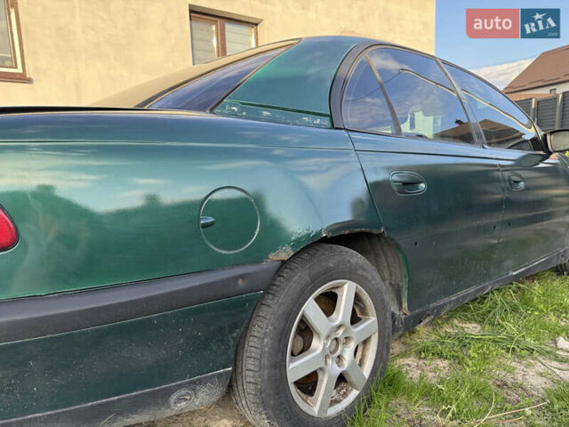 Зеленый Опель Омега, объемом двигателя 2 л и пробегом 300 тыс. км за 1700 $, фото 2 на Automoto.ua