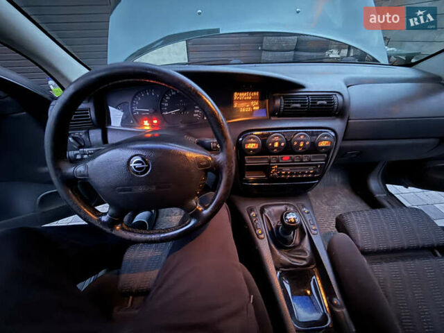 Зелений Опель Омега, об'ємом двигуна 2 л та пробігом 397 тис. км за 2500 $, фото 7 на Automoto.ua