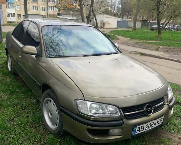 Зеленый Опель Омега, объемом двигателя 2 л и пробегом 503 тыс. км за 2800 $, фото 2 на Automoto.ua