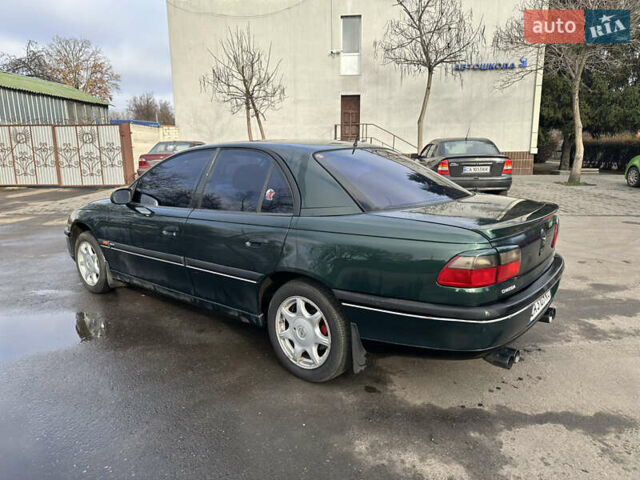 Зеленый Опель Омега, объемом двигателя 2.96 л и пробегом 345 тыс. км за 3000 $, фото 5 на Automoto.ua