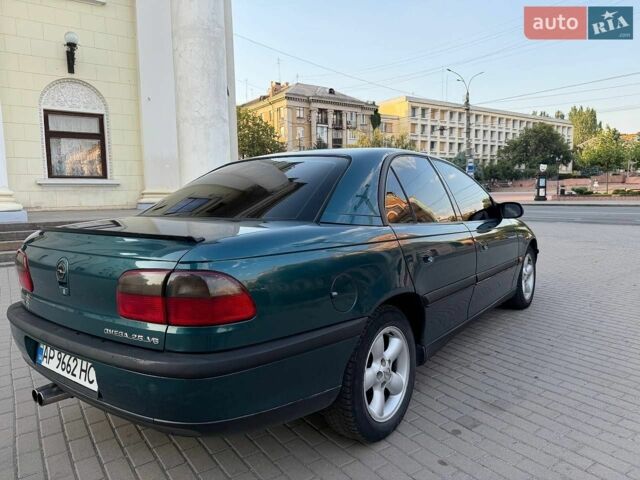 Зеленый Опель Омега, объемом двигателя 2.5 л и пробегом 250 тыс. км за 1950 $, фото 5 на Automoto.ua