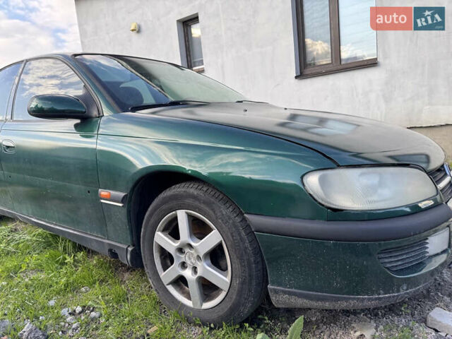 Зеленый Опель Омега, объемом двигателя 2 л и пробегом 300 тыс. км за 1700 $, фото 5 на Automoto.ua