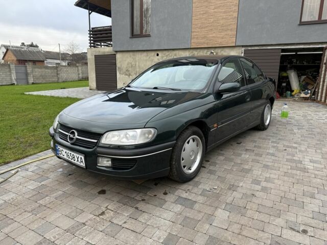 Зеленый Опель Омега, объемом двигателя 2 л и пробегом 397 тыс. км за 2500 $, фото 6 на Automoto.ua