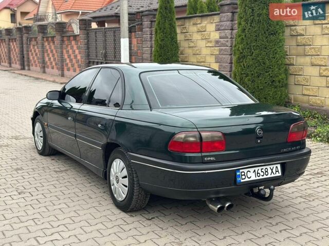 Зеленый Опель Омега, объемом двигателя 2 л и пробегом 265 тыс. км за 1999 $, фото 5 на Automoto.ua