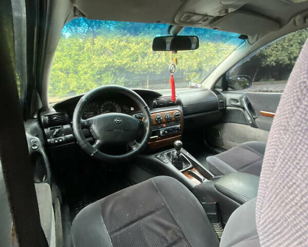 Зеленый Опель Омега, объемом двигателя 2 л и пробегом 300 тыс. км за 1750 $, фото 17 на Automoto.ua