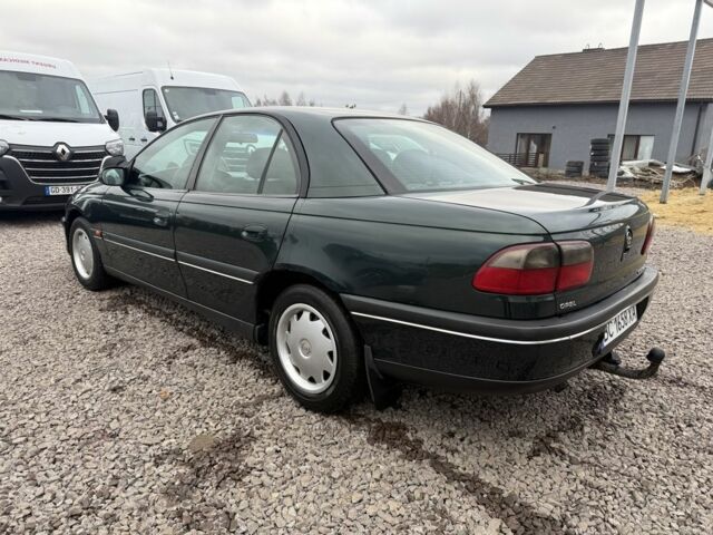 Зеленый Опель Омега, объемом двигателя 2 л и пробегом 397 тыс. км за 2500 $, фото 2 на Automoto.ua