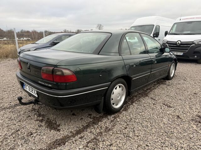 Зеленый Опель Омега, объемом двигателя 2 л и пробегом 397 тыс. км за 2500 $, фото 1 на Automoto.ua