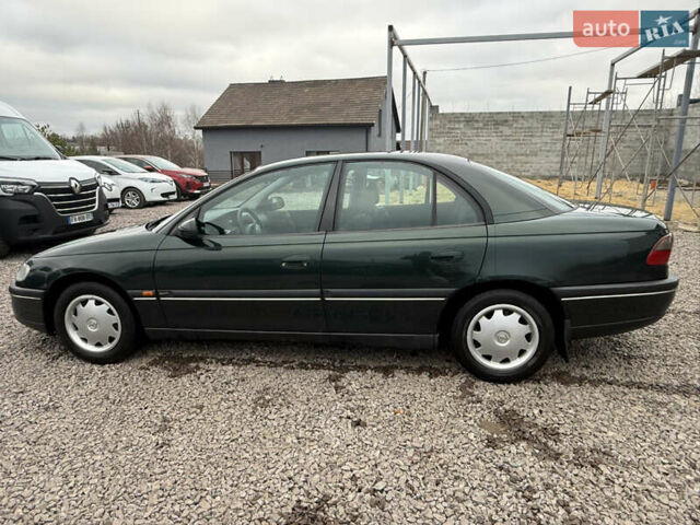 Зелений Опель Омега, об'ємом двигуна 2 л та пробігом 397 тис. км за 2500 $, фото 4 на Automoto.ua