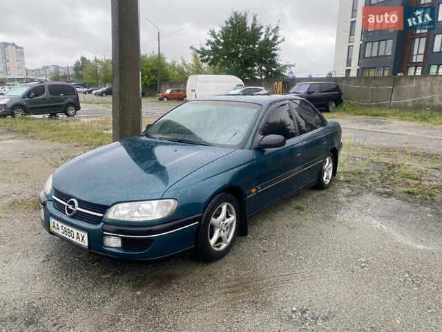 Зеленый Опель Омега, объемом двигателя 2 л и пробегом 298 тыс. км за 3200 $, фото 1 на Automoto.ua