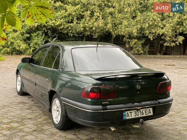 Зеленый Опель Омега, объемом двигателя 2 л и пробегом 300 тыс. км за 1750 $, фото 6 на Automoto.ua