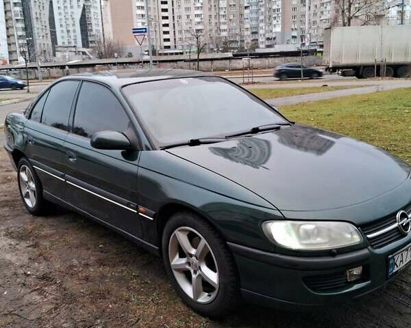 Зеленый Опель Омега, объемом двигателя 2 л и пробегом 228 тыс. км за 2900 $, фото 13 на Automoto.ua