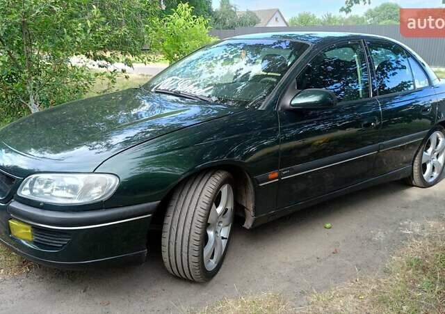 Зелений Опель Омега, об'ємом двигуна 2.5 л та пробігом 250 тис. км за 3000 $, фото 6 на Automoto.ua