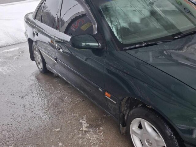 Зеленый Опель Омега, объемом двигателя 2 л и пробегом 418 тыс. км за 1500 $, фото 2 на Automoto.ua