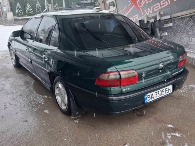 Зеленый Опель Омега, объемом двигателя 2 л и пробегом 418 тыс. км за 1500 $, фото 3 на Automoto.ua