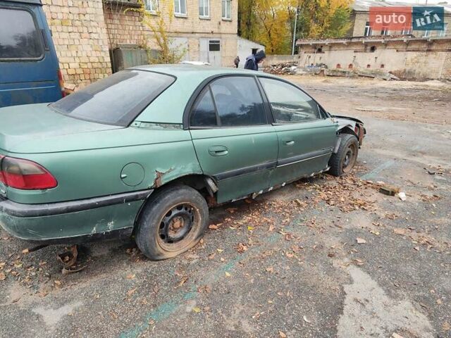 Зеленый Опель Омега, объемом двигателя 1.98 л и пробегом 350 тыс. км за 500 $, фото 1 на Automoto.ua