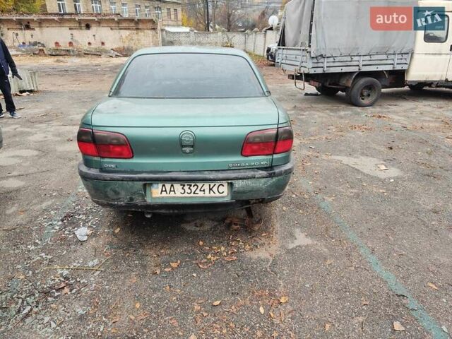 Зеленый Опель Омега, объемом двигателя 1.98 л и пробегом 350 тыс. км за 500 $, фото 2 на Automoto.ua