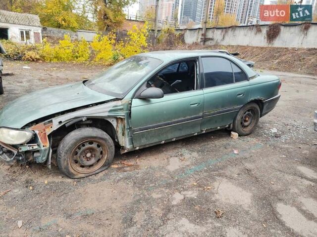 Зеленый Опель Омега, объемом двигателя 1.98 л и пробегом 350 тыс. км за 500 $, фото 3 на Automoto.ua