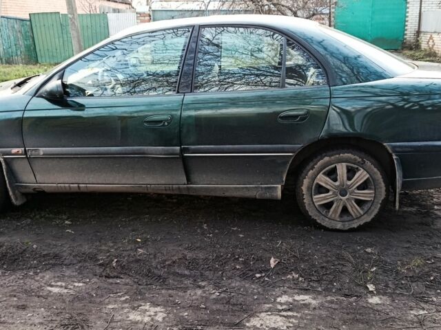 Зеленый Опель Омега, объемом двигателя 2.5 л и пробегом 200 тыс. км за 1600 $, фото 1 на Automoto.ua
