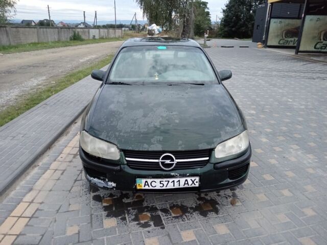Зеленый Опель Омега, объемом двигателя 2 л и пробегом 300 тыс. км за 617 $, фото 1 на Automoto.ua