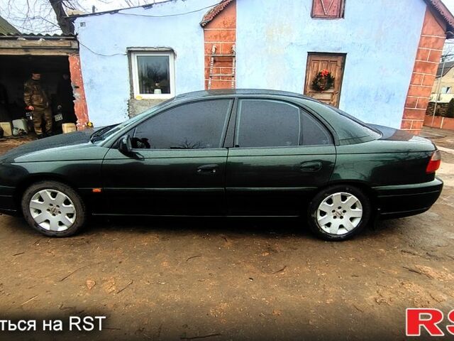 Зелений Опель Омега, об'ємом двигуна 2.5 л та пробігом 0 тис. км за 2700 $, фото 3 на Automoto.ua