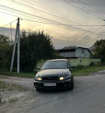 Зеленый Опель Омега, объемом двигателя 2.5 л и пробегом 350 тыс. км за 2500 $, фото 1 на Automoto.ua