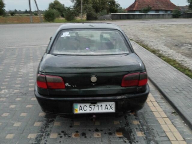 Зеленый Опель Омега, объемом двигателя 2 л и пробегом 300 тыс. км за 617 $, фото 3 на Automoto.ua