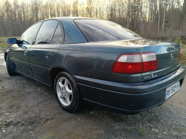 Зеленый Опель Омега, объемом двигателя 2.5 л и пробегом 344 тыс. км за 2250 $, фото 3 на Automoto.ua
