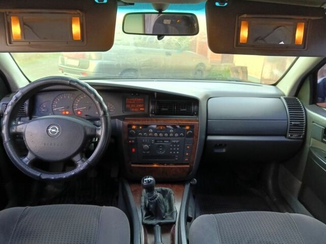 Зеленый Опель Омега, объемом двигателя 2.5 л и пробегом 344 тыс. км за 2250 $, фото 7 на Automoto.ua