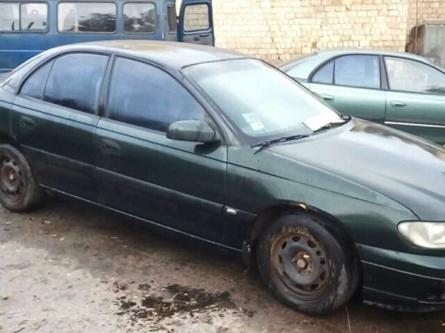 Зеленый Опель Омега, объемом двигателя 2 л и пробегом 350 тыс. км за 1200 $, фото 2 на Automoto.ua