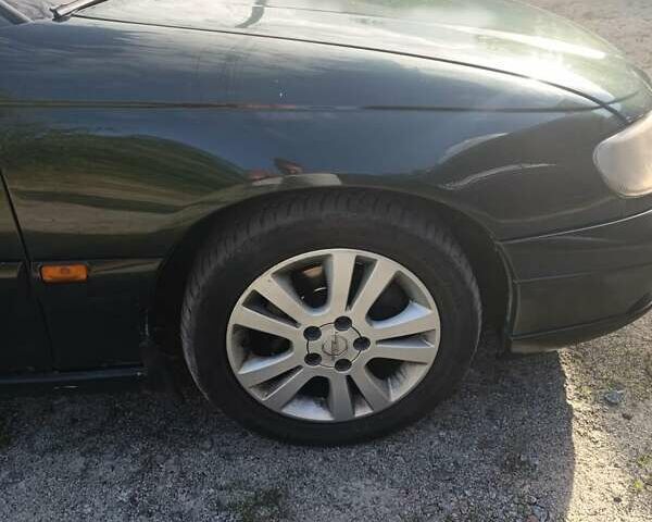 Опель Омега 2000 в Ирпене на Automoto.ua Зеленый Опель Омега, объемом двигателя 2 л и пробегом 400 тыс. км за 2350 $, фото 5 на Automoto.ua