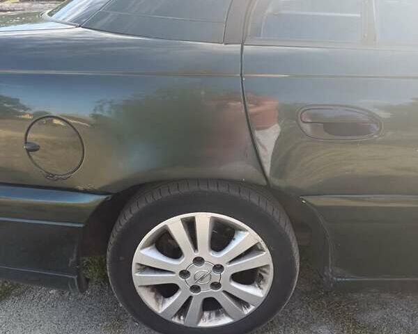 Опель Омега 2000 в Ирпене на Automoto.ua Зеленый Опель Омега, объемом двигателя 2 л и пробегом 400 тыс. км за 2350 $, фото 7 на Automoto.ua