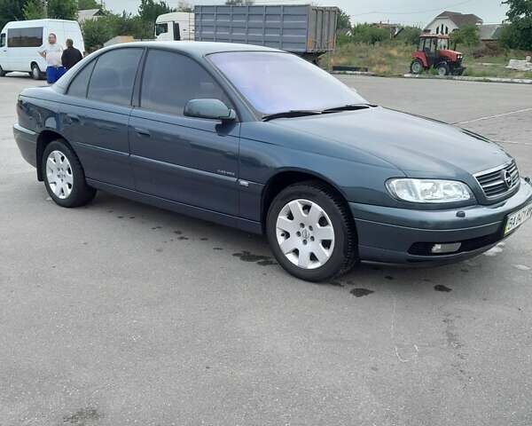 Зелений Опель Омега, об'ємом двигуна 2.2 л та пробігом 125 тис. км за 4950 $, фото 3 на Automoto.ua