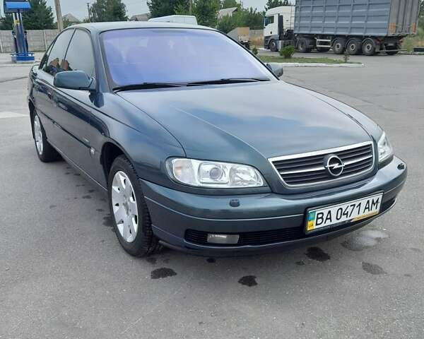 Зелений Опель Омега, об'ємом двигуна 2.2 л та пробігом 125 тис. км за 4950 $, фото 11 на Automoto.ua