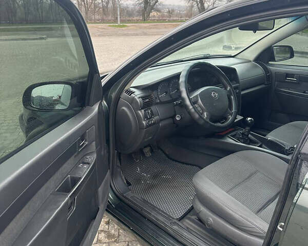 Зеленый Опель Омега, объемом двигателя 2.2 л и пробегом 200 тыс. км за 3000 $, фото 4 на Automoto.ua