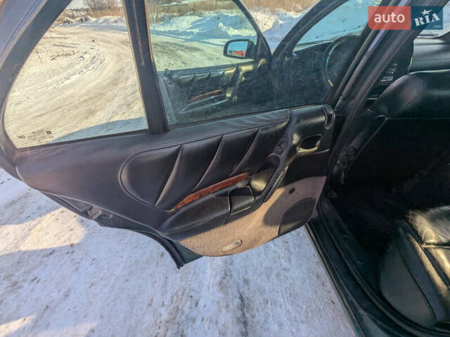 Зелений Опель Омега, об'ємом двигуна 2.2 л та пробігом 280 тис. км за 1999 $, фото 14 на Automoto.ua