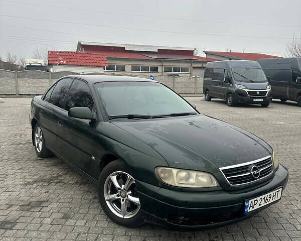 Зеленый Опель Омега, объемом двигателя 2.2 л и пробегом 200 тыс. км за 3000 $, фото 1 на Automoto.ua