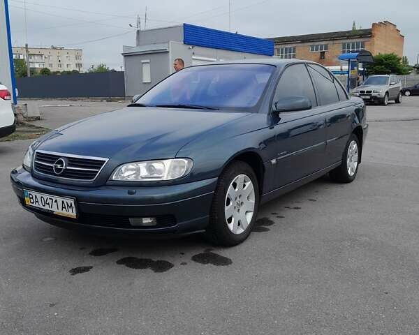 Зелений Опель Омега, об'ємом двигуна 2.2 л та пробігом 125 тис. км за 4950 $, фото 13 на Automoto.ua