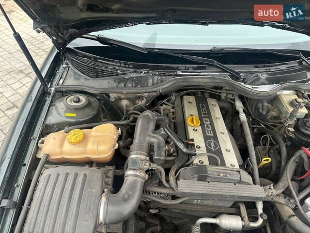 Зеленый Опель Омега, объемом двигателя 2.2 л и пробегом 200 тыс. км за 3000 $, фото 14 на Automoto.ua