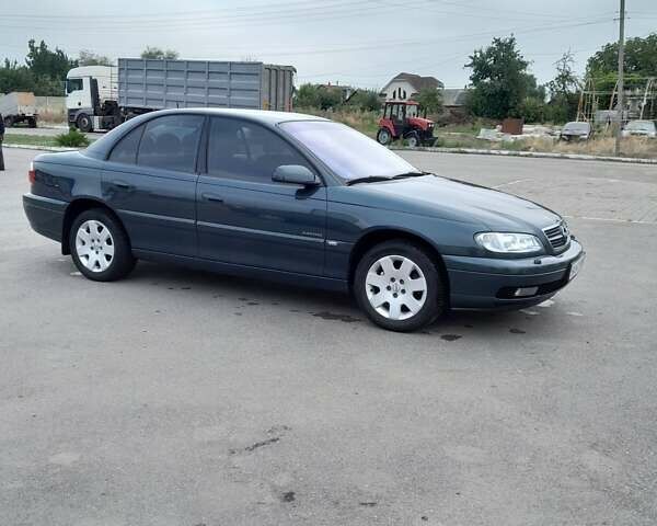Зелений Опель Омега, об'ємом двигуна 2.2 л та пробігом 125 тис. км за 4950 $, фото 8 на Automoto.ua