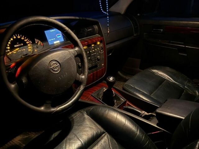 Зелений Опель Омега, об'ємом двигуна 2.2 л та пробігом 369 тис. км за 1000 $, фото 9 на Automoto.ua