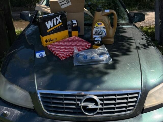 Зелений Опель Омега, об'ємом двигуна 2.2 л та пробігом 369 тис. км за 1000 $, фото 6 на Automoto.ua