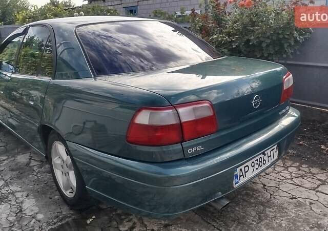 Зелений Опель Омега, об'ємом двигуна 2.2 л та пробігом 475 тис. км за 3700 $, фото 4 на Automoto.ua