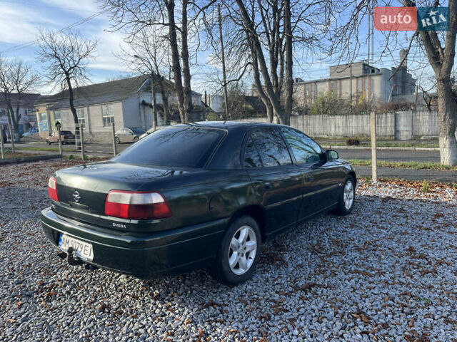 Зеленый Опель Омега, объемом двигателя 2.2 л и пробегом 350 тыс. км за 2500 $, фото 3 на Automoto.ua