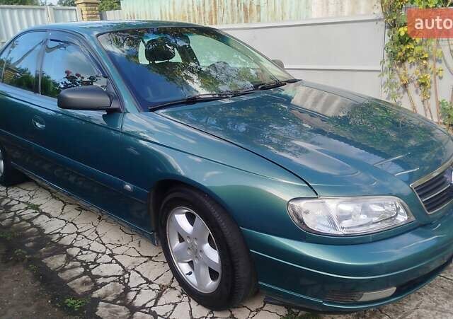 Зелений Опель Омега, об'ємом двигуна 2.2 л та пробігом 475 тис. км за 3700 $, фото 3 на Automoto.ua